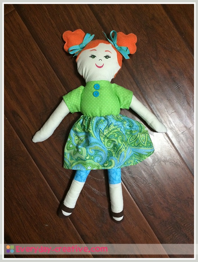 Redhead rag doll with fabric body and basic skirt